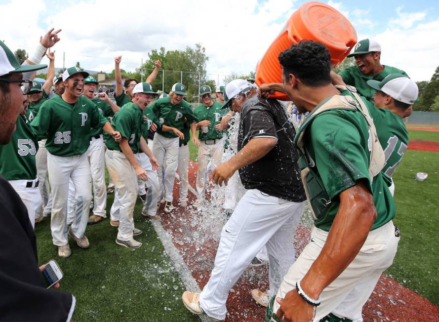 Palo Verde players celebrate their 4-2 win over Basic for the NIAA 4A baseball championship ...