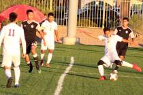 Sunrise Mountain’s Estiben Olandez takes a shot during his team’s Class 3A state ...