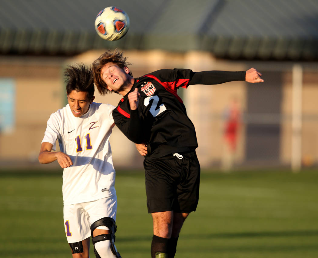 Durango’s Christopher Bramasco (11) and Las Vegas’ Drew Bowden (2) battle for th ...