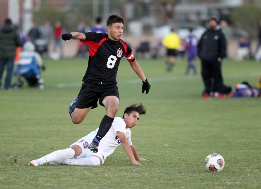 Las Vegas’ Daniel Rangel (8) and Durango’s Adonis Rodriguez (39) battle for the ...