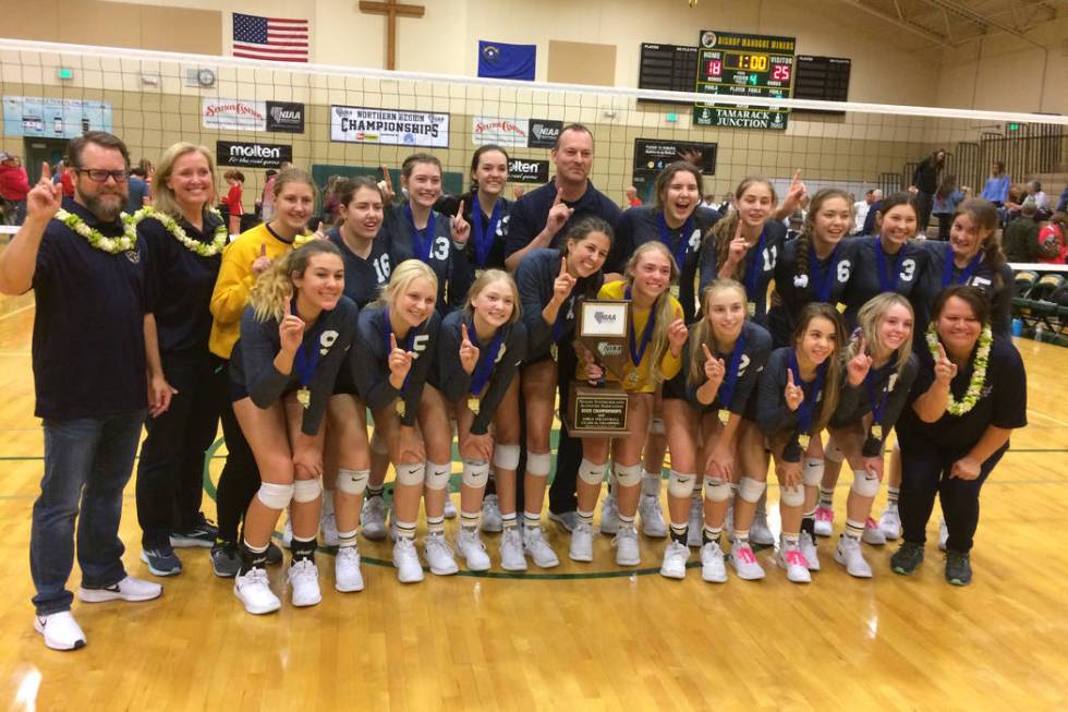 Boulder City’s girls volleyball team poses after winning the Class 3A state championsh ...