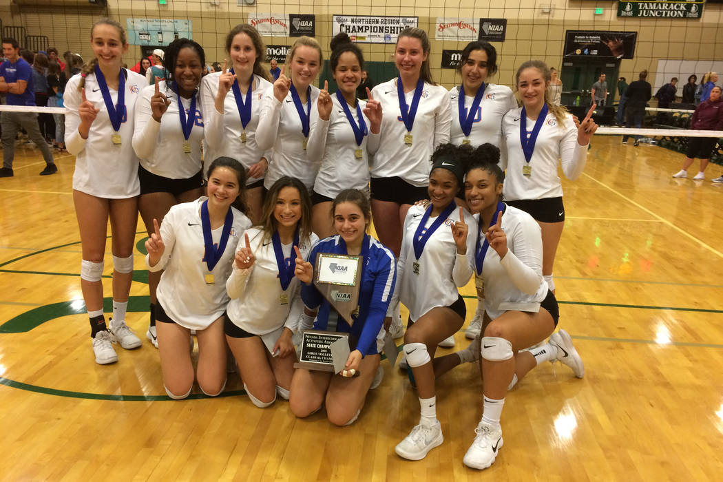 Bishop Gorman poses with the Class 4A state championship trophy. (Robert Perea/Special to th ...