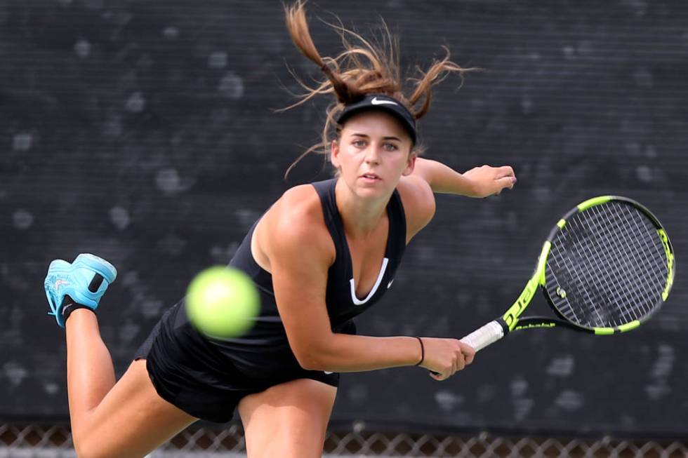 Clark junior Audrey Boch-Collins serves during a dual match at Green Valley High School Wedn ...