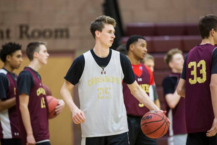 Faith Lutheran senior guard Brevin Walter, middle, runs through a drill during practice on M ...