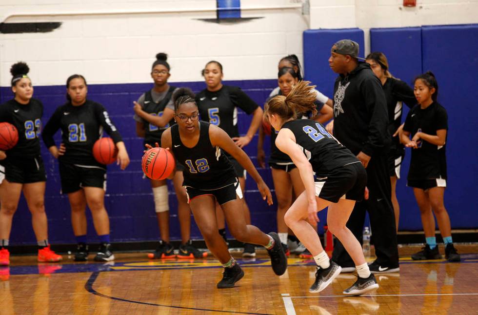 Shania Harper (12), a senior forward on the Sierra Vista High School varsity basketball team ...