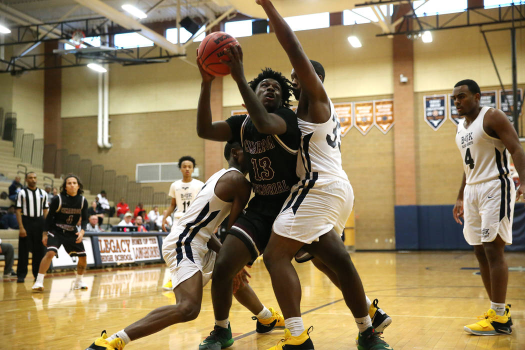 Cimarron-Memorial’s Brian Lang (13) looks for an open shot against Democracy Prep&#821 ...