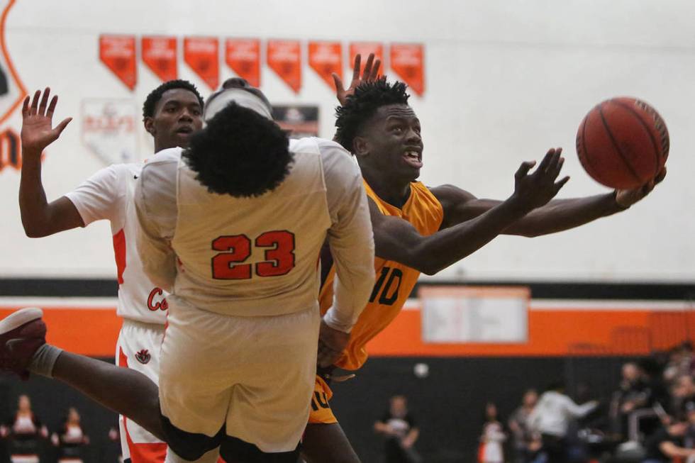 Eldorado’s Grayling Atkins (10) dodges Chaparral’s Dejonte Allen (23) with the b ...