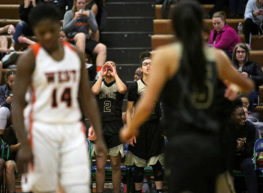 Spring Valley players on the sidelines cheer for their teammates during the second half of a ...