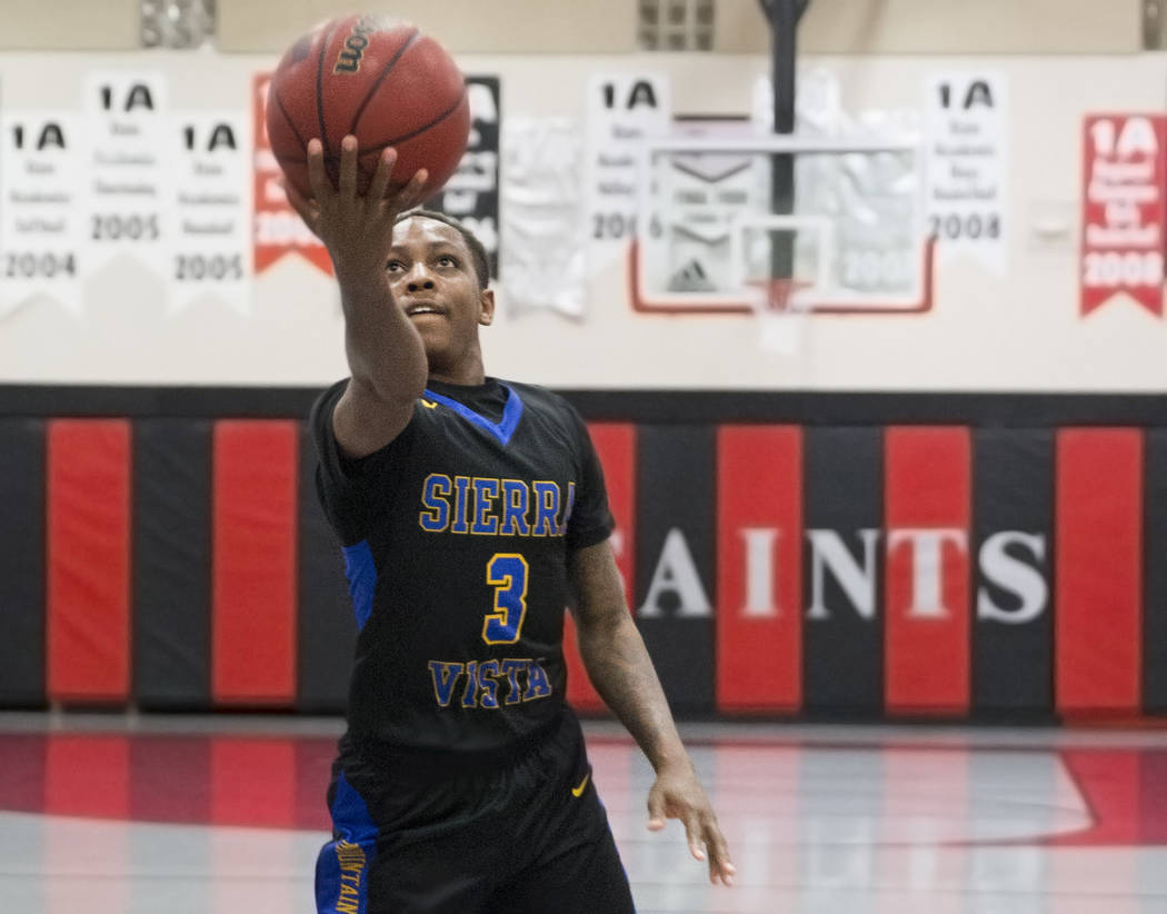 nSierra Vista senior Calvin Richards (3) converts a fast break layup in the first quarter du ...