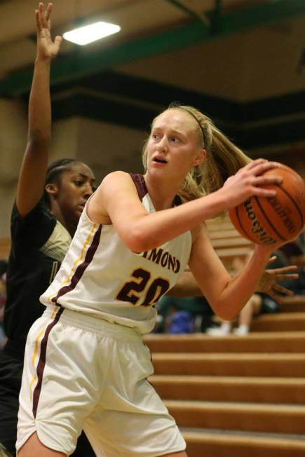 Dimond’s Kimmie Roth (20) is pressured by Spring Valley’s Aaliyah Gayles (3) in ...