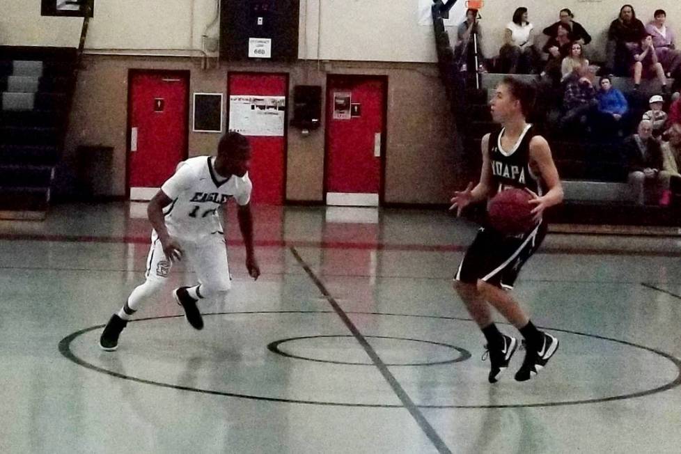 Spring Mountain’s Traceo Meadows, left, defends Moapa Valley’s Preston Humes on ...