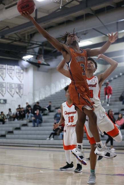 Legacy’s Rayshon Funches (3) takes a shot under pressure from Chaparral’s Sameal ...