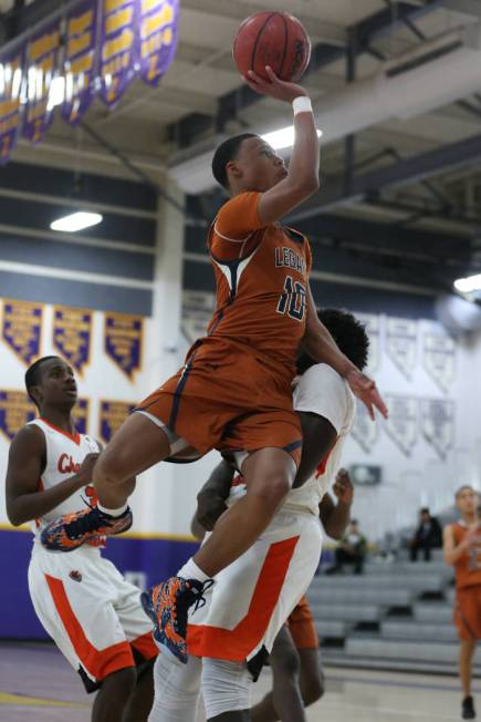 Legacy’s Emmanuel Austin (10) takes a shot against Chaparral before getting called for ...