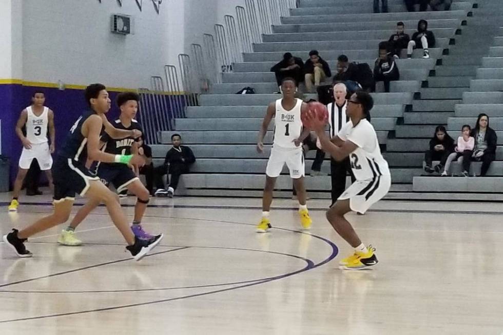 Democracy Prep’s Elijah Barnes takes a 3-pointer on Saturday during the Battle Born Cl ...