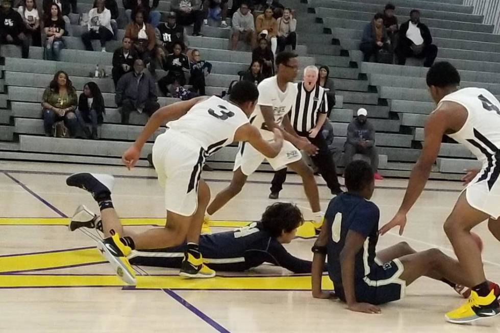 Democracy Prep and Bonita Vista (California) players scramble for a loose ball Saturday duri ...