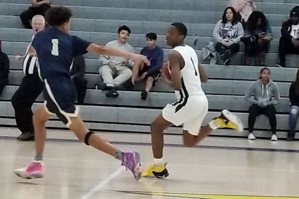 Democracy Prep’s Najeeb Muhammad, right, pushes the ball down the floor against Bonita ...