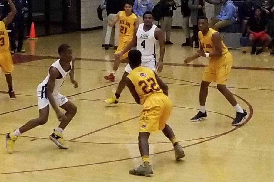 Del Sol’s LaVerk Hodges, right, drives against Democracy Prep’s Najeeb Muhammad ...