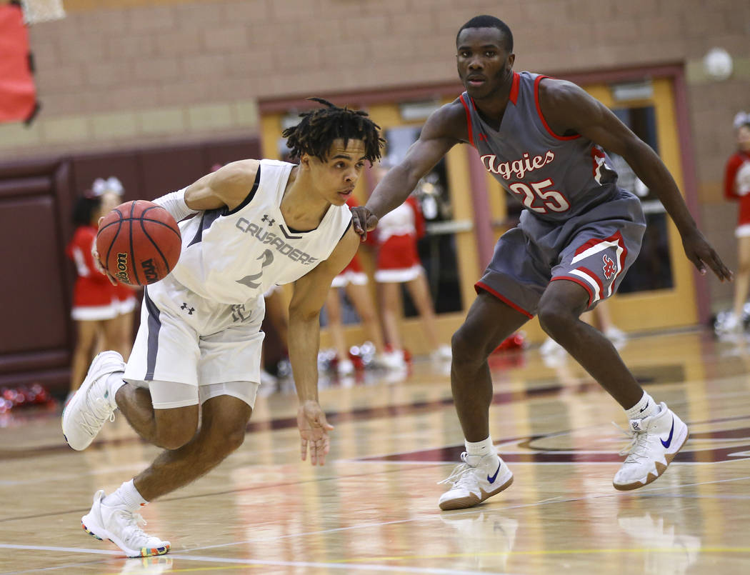 Faith Lutheran’s Donavan Jackson (2) drives the ball against Arbor View’s Larry ...