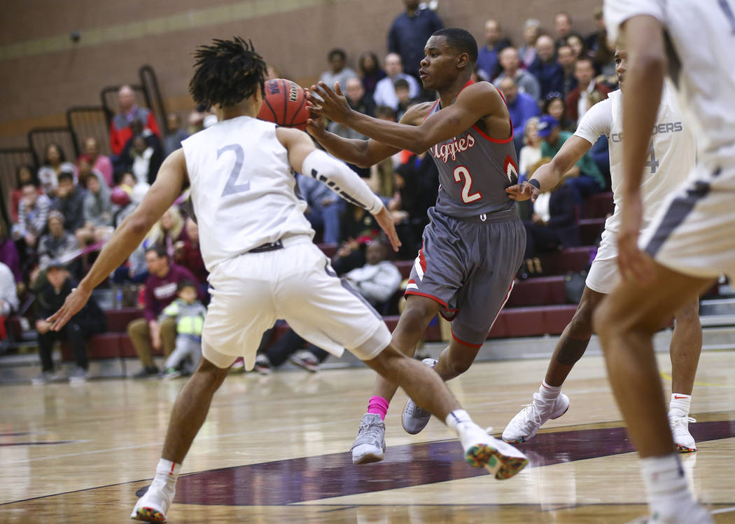 Arbor View’s Favor Chukwukelu (2) passes the ball during the first half of a basketbal ...