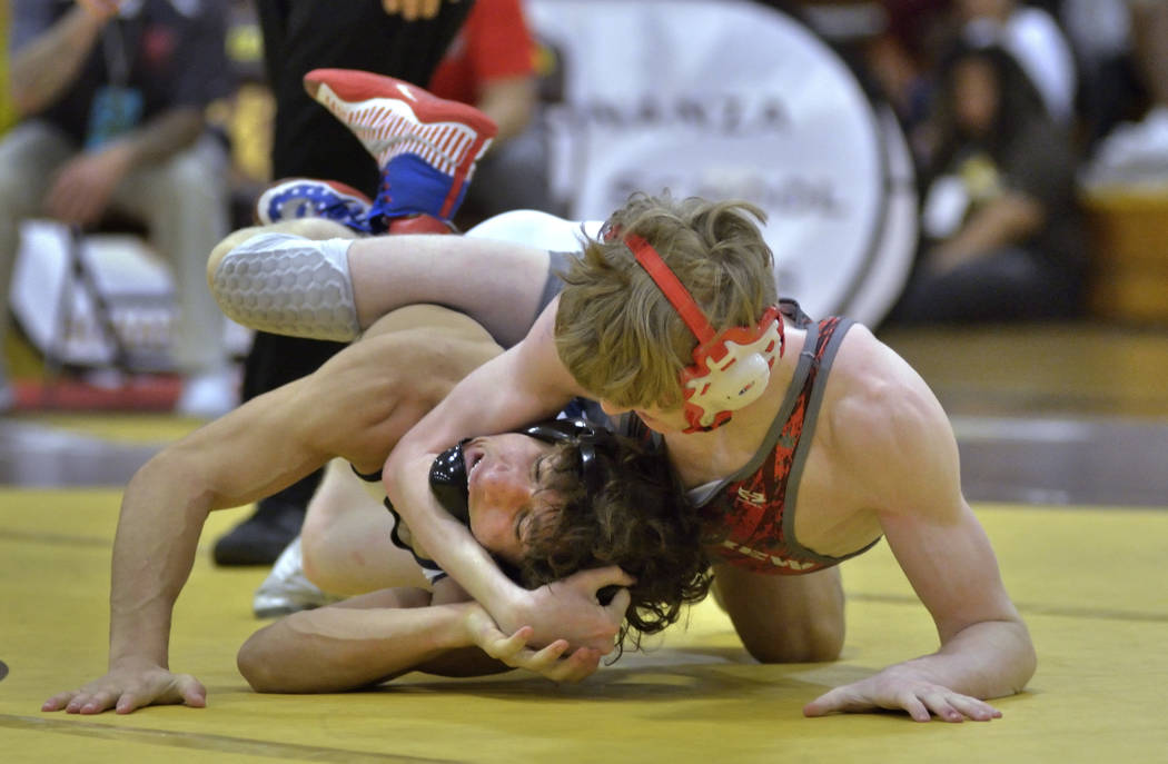 Triston Curtis of Shadow Ridge High School, left, and James Wilson from Arbor View High Scho ...