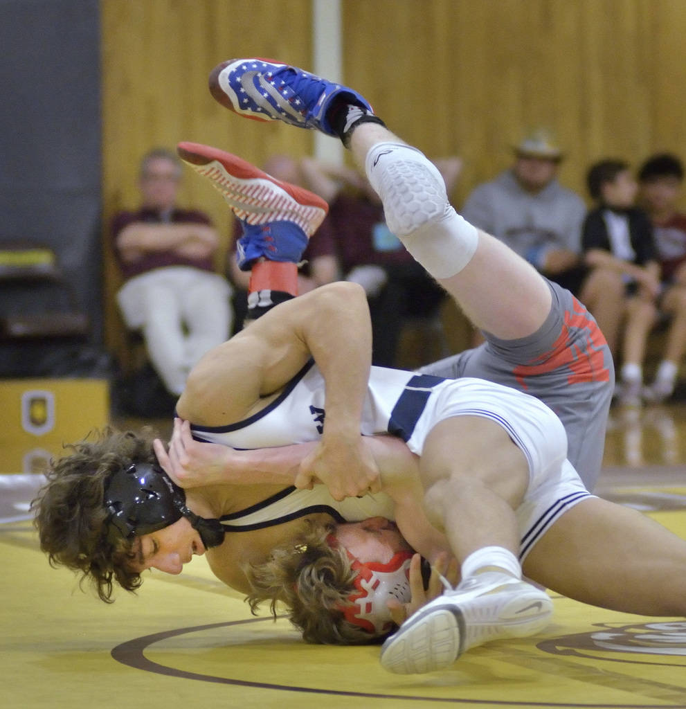 Triston Curtis of Shadow Ridge High School, left, and James Wilson from Arbor View High Scho ...