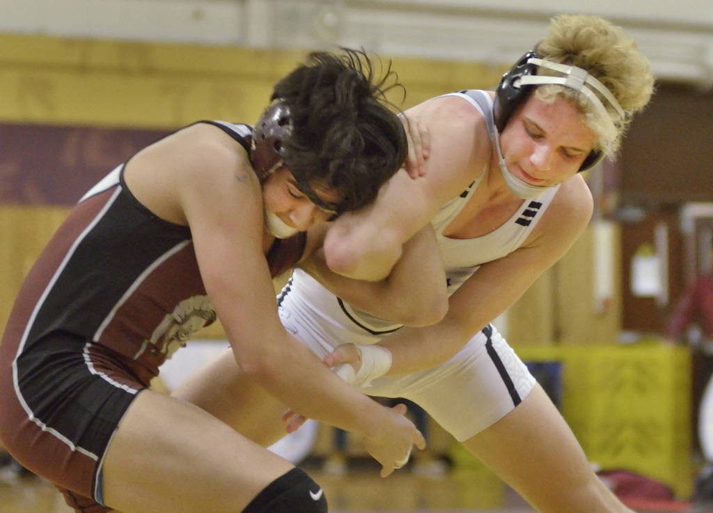 Daniel Rodriguez of Cimarron-Memorial High School, left, and Carson Cook from Faith Lutheran ...