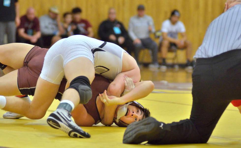 Daniel Rodriguez of Cimarron-Memorial High School, bottom, and Carson Cook from Faith Luther ...