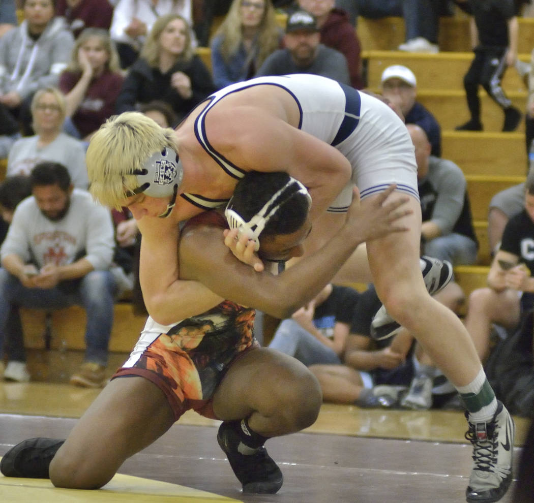 Matthew Rodgers of Cimarron-Memorial High School (in dark jersey) and Marc Williams from Sha ...