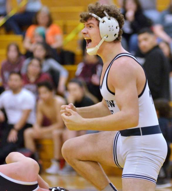 Noah Gallardo from Shadow Ridge High School celebrates after winning his match against Johnn ...