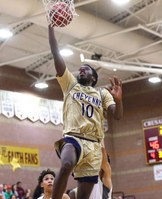 Cheyenne’s De’Kquante Hayes (10) goes to the basket during the second half of a ...