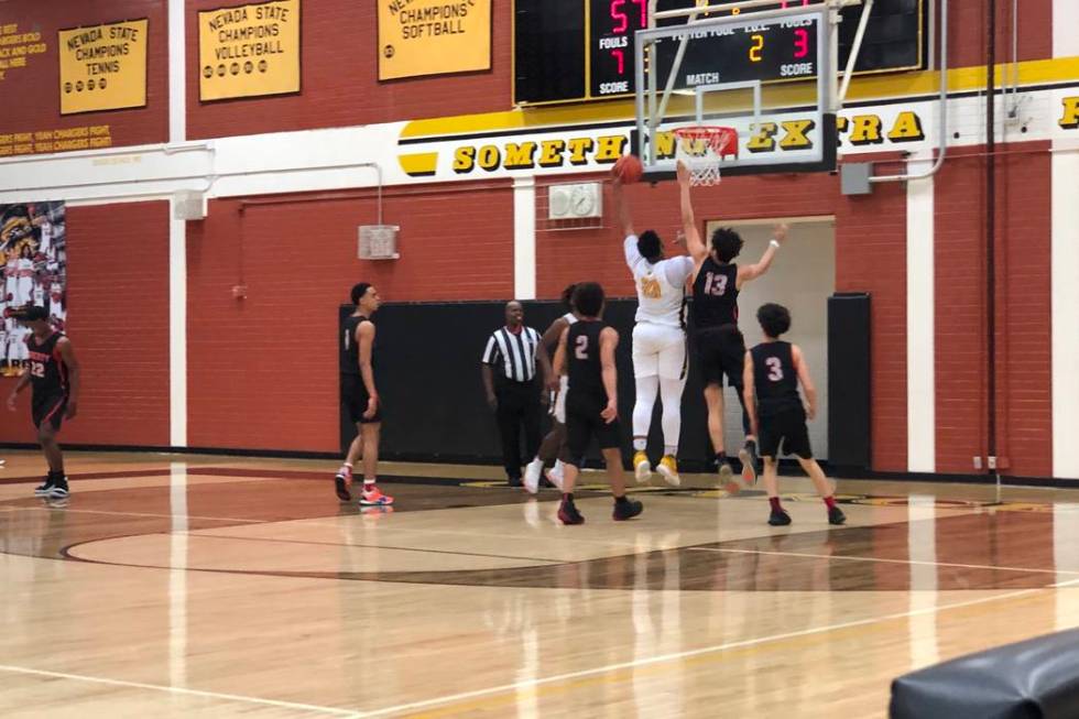 Clark senior Antwon Jackson makes a layup in the fourth quarter of a 69-47 victory over Libe ...