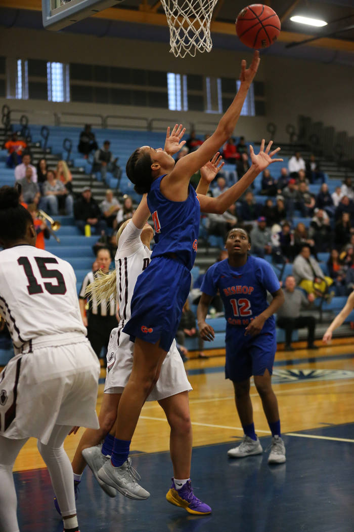 Bishop Gorman’s Olivia Smith (11) shoots the ball for a score and to beat the buzzer i ...