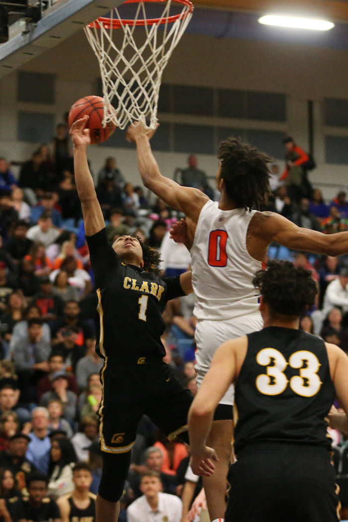 Bishop Gorman’s Isaiah Cottrell (0) blocks Clark’s Frankie Collins (1) in the De ...