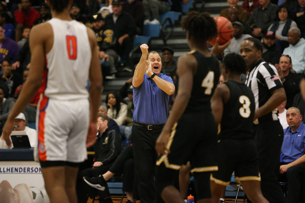 Bishop Gorman head coach Grant Rice reacts after a play against Clark in the Desert Region b ...