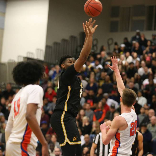 Clark’s Antwon Jackson (23) takes a shot for a score against Bishop Gorman in the Dese ...