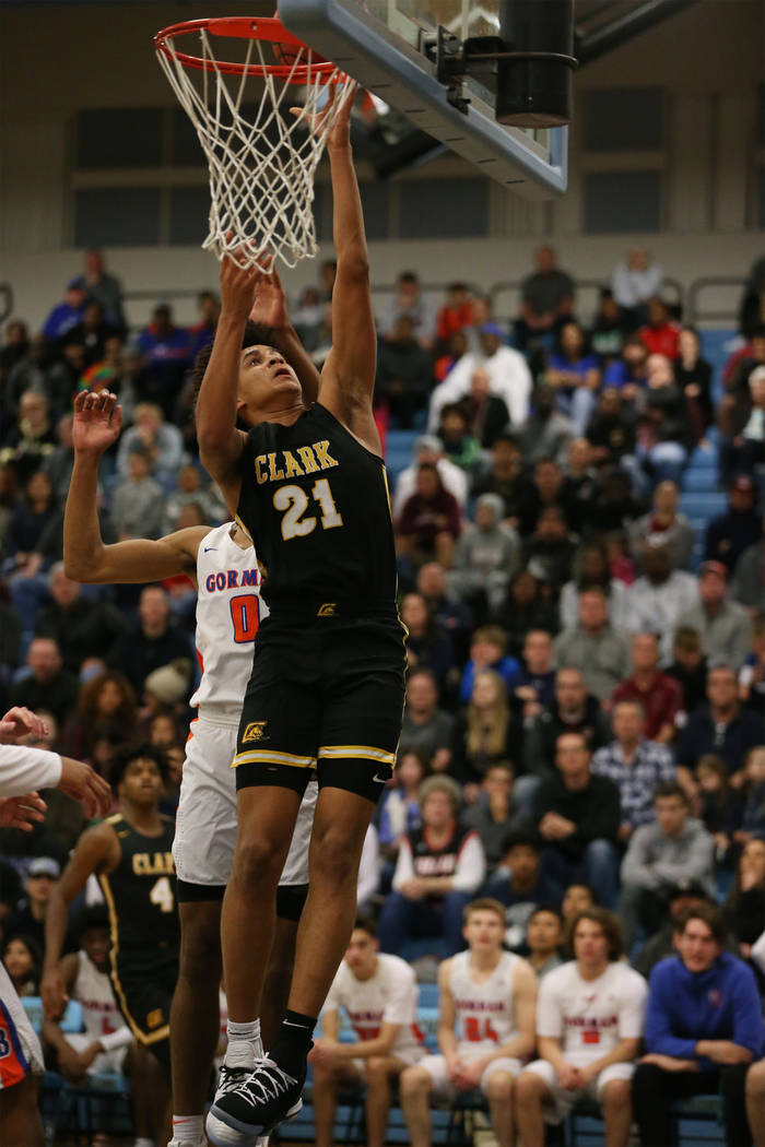 Clark’s Jalen Hill (21) goes up for a shot against Bishop Gorman in the Desert Region ...