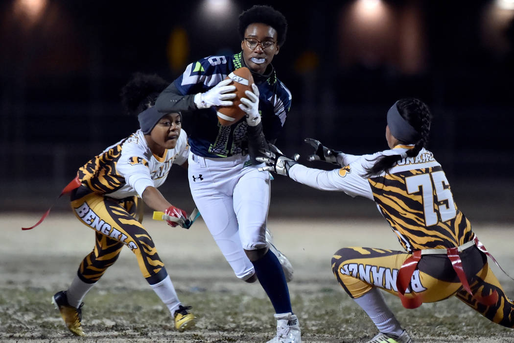 Green Valley’s Deborah Grant (16) carries the ball against Bonanza during Class 4A sta ...