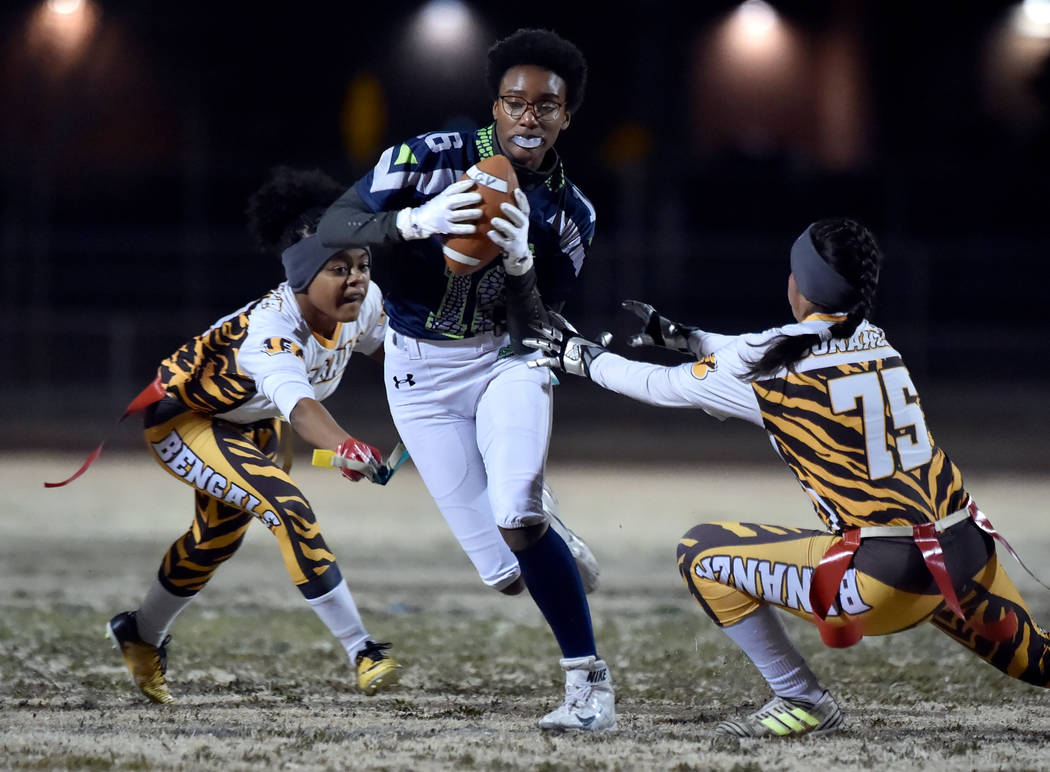 Green Valley’s Deborah Grant (16) carries the ball against Bonanza during Class 4A sta ...