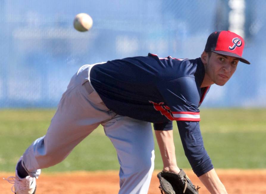 Liberty high’s pitcher Garrett Maloney delivers against Centennial High during their b ...