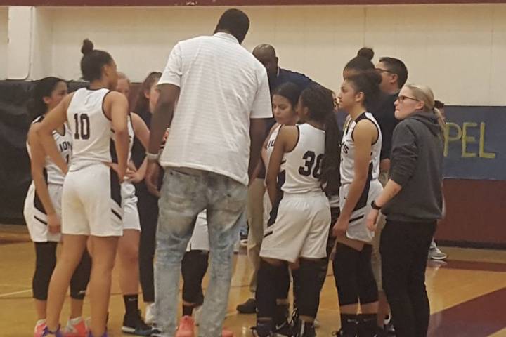 Calvary Chapel coach Shay Johnson speaks to his team during the fourth quarter of the Class ...
