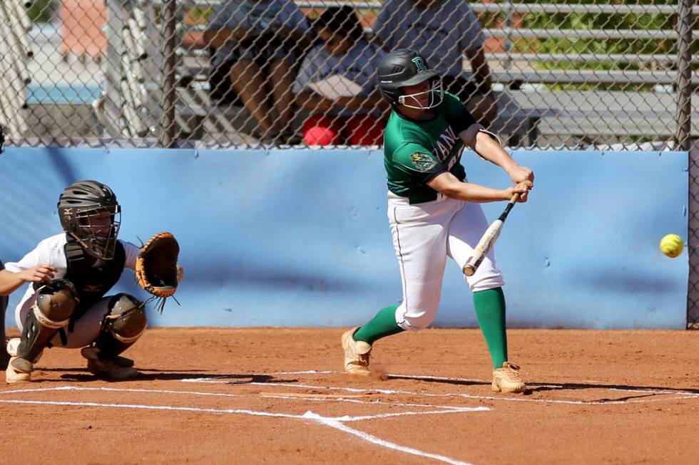 Rancho’s MacKenzie Perry (99) gets a hit against Foothill in the first inning of their ...