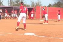 Arbor View’s Kylie Sharapan (center) prepares to deliver a pitch against Coronado in a ...