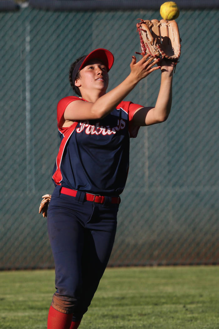 Liberty’s Shelby Carvalho (13) makes a catch in the outfield against Desert Oasis in t ...