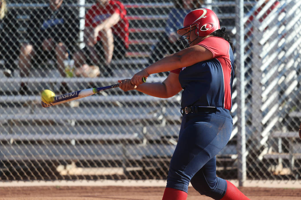 Liberty’s Fia Tofi (74) connects for a double against Desert Oasis at Desert Oasis Hig ...