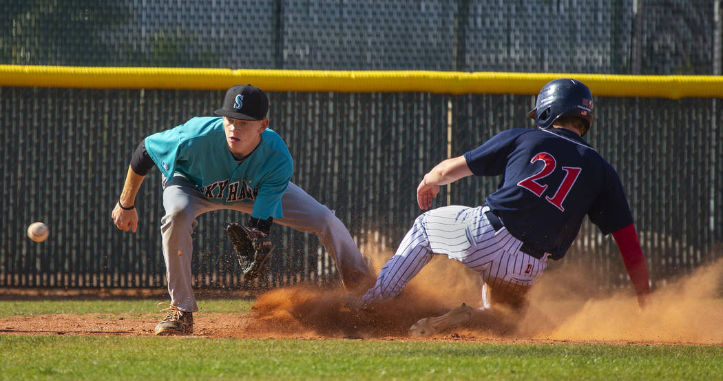 Silverado infielder Austin Whittaker (25) is unable to get the ball in time as Coronado runn ...