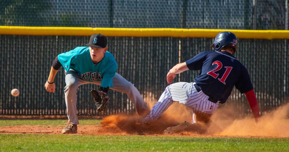 Silverado infielder Austin Whittaker (25) is unable to get the ball in time as Coronado runn ...