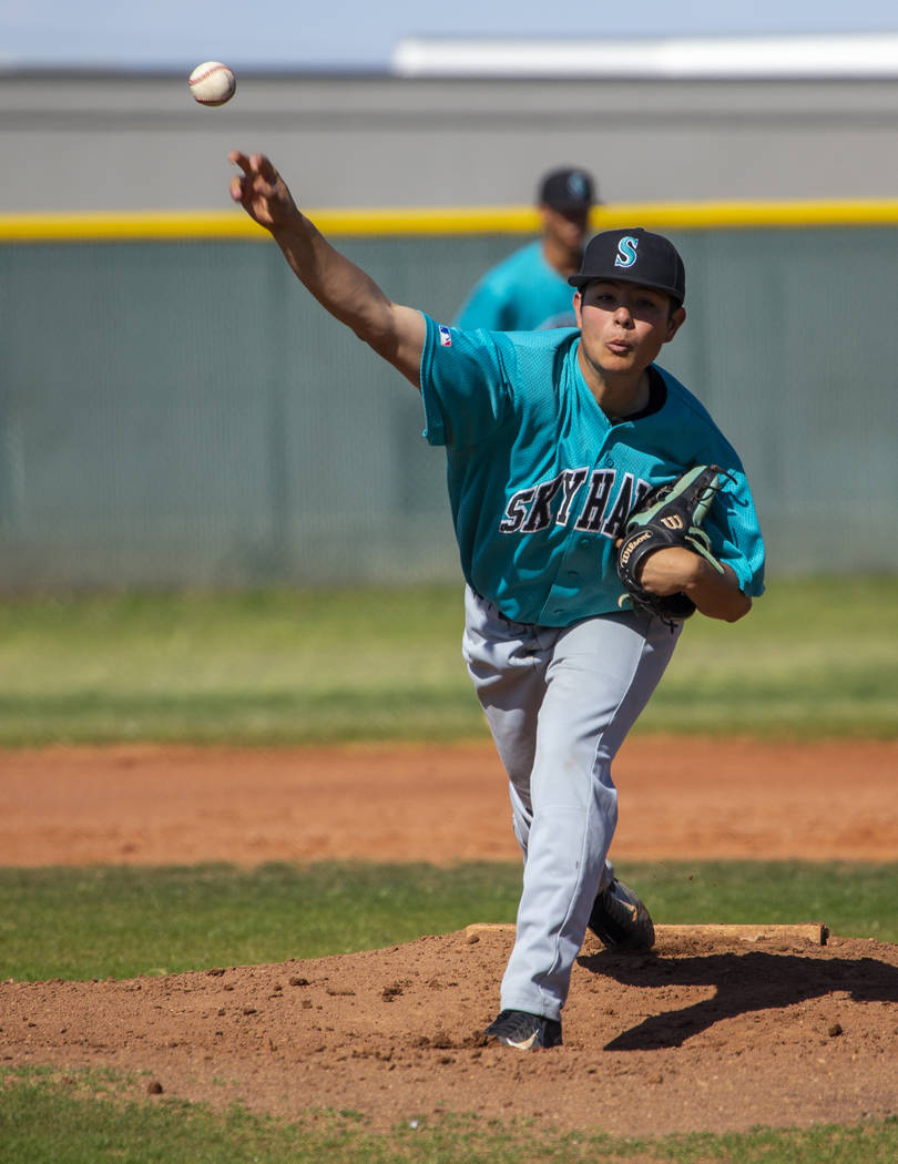 Silverado pitcher Angel Garcia (4) tosses a ball towards the plate versus Coronado during th ...