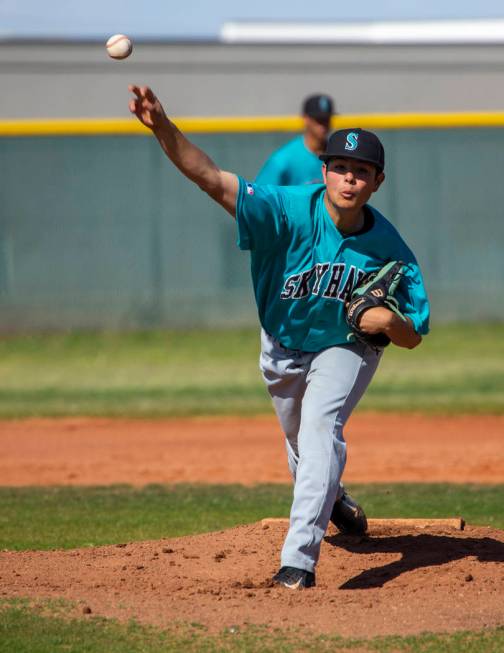 Silverado pitcher Angel Garcia (4) tosses a ball towards the plate versus Coronado during th ...