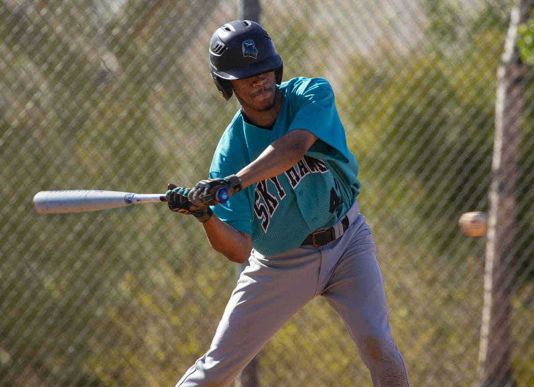 Silverado infielder Caleb Hubbard (42) eyes a pitch over the plate from Coronado during thei ...