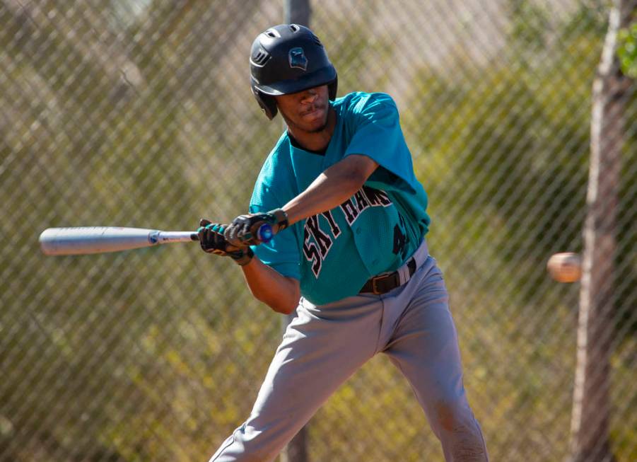 Silverado infielder Caleb Hubbard (42) eyes a pitch over the plate from Coronado during thei ...